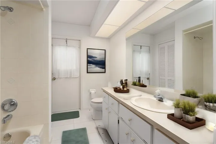 Full bathroom with shower, vanity and bathtub