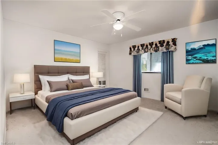 Virtually Staged Carpeted bedroom with ceiling fan** Virtually Staged**