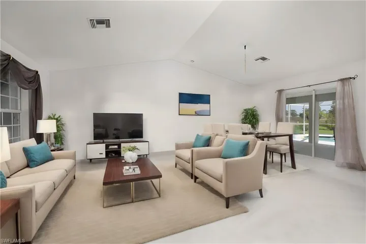 Living room with vaulted ceiling** Virtually Staged**