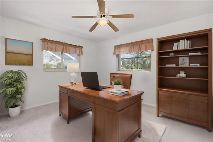 Office area featuring ceiling fan** Virtually Staged**