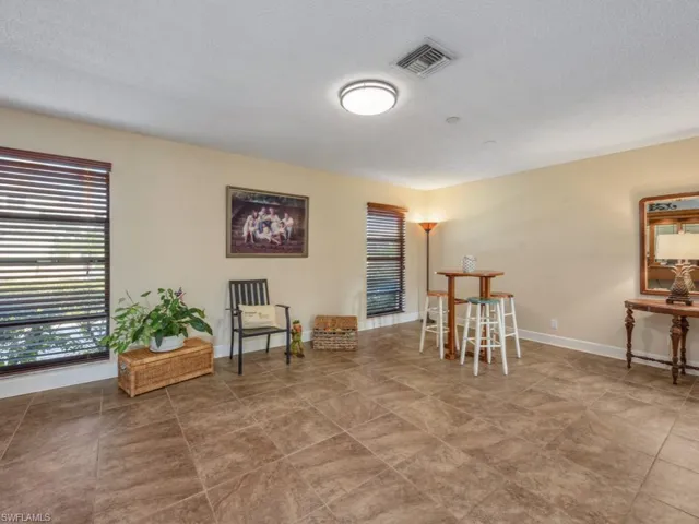 Living area featuring a textured ceiling