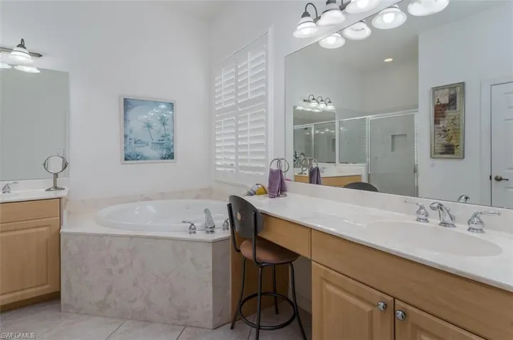 Primary Bath has jetted tub.