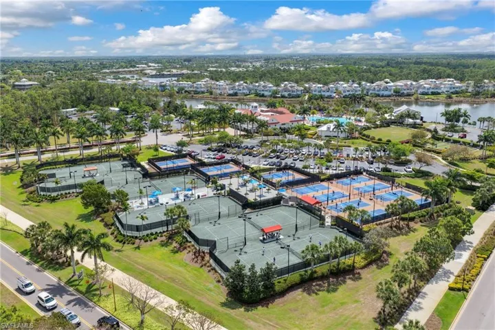 Extensive recreational area featuring multiple tennis courts and numerous pickleball courts