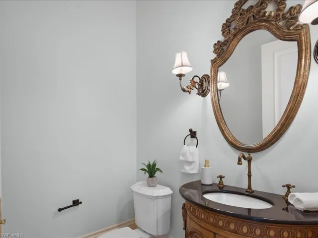 1/2 Bath - Powder Room off of Den/Office/Library