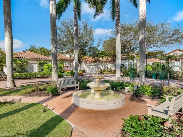 Front of house views the Rivoli Ct. Cul-de-Sac Park with Fountain and Sitting Area