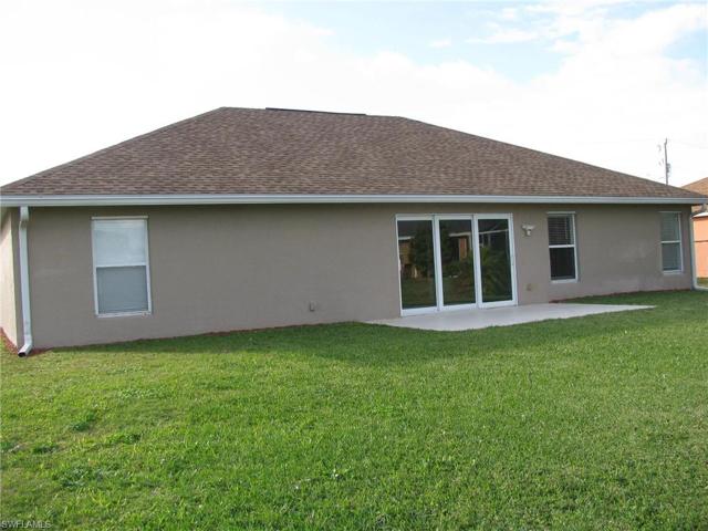 Rear of yard looking at house