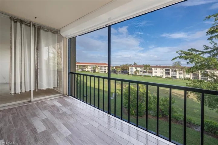 Tiled balcony, screened in over looking golf course