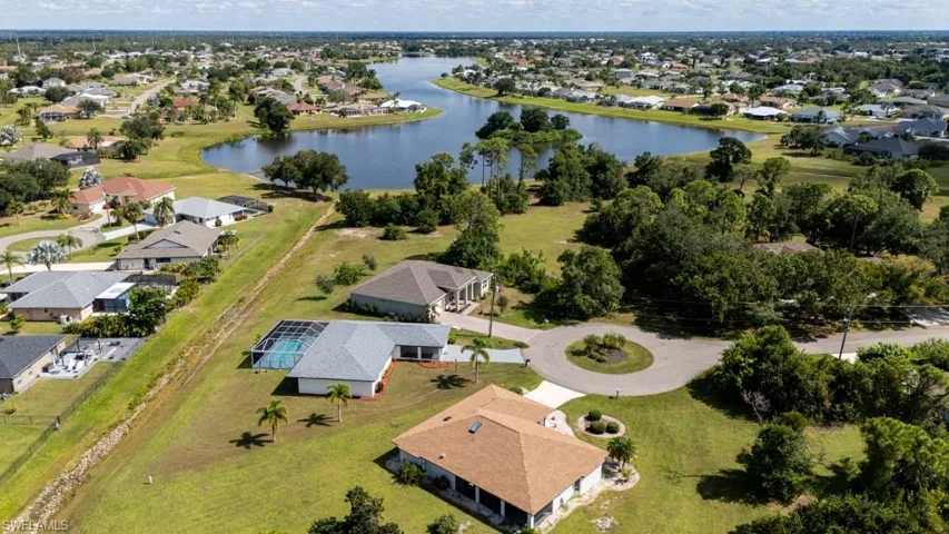 Aerial view showcasing the property and nearby waterways.