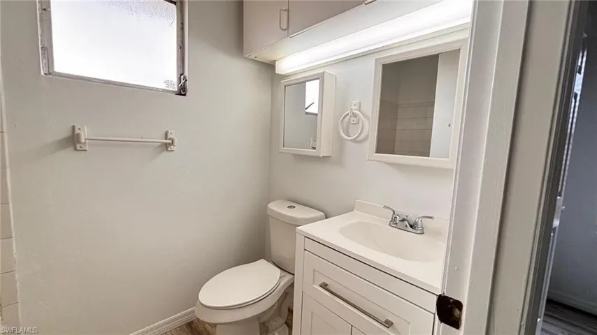 Bathroom with vanity and toilet
