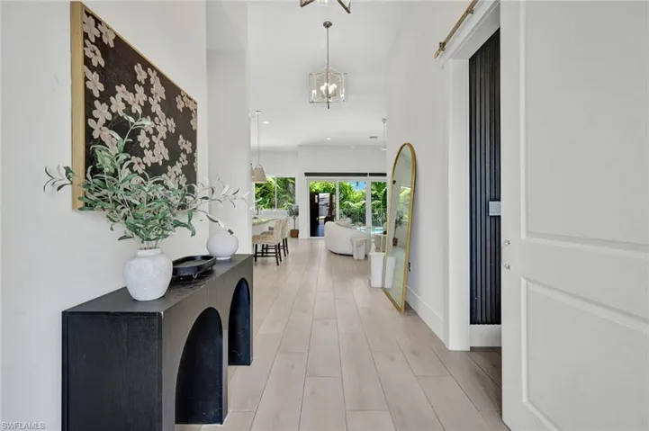 Upon entering, you will be WOWED by expansive spaces and pool views!