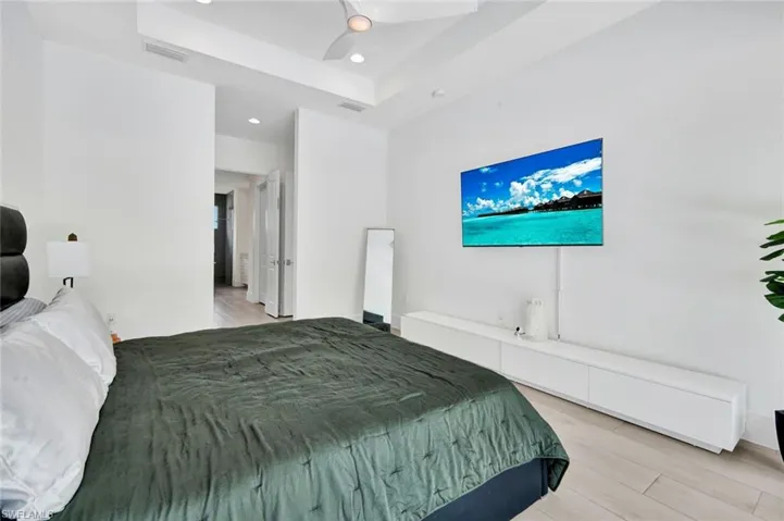 Notice the tray ceilings.