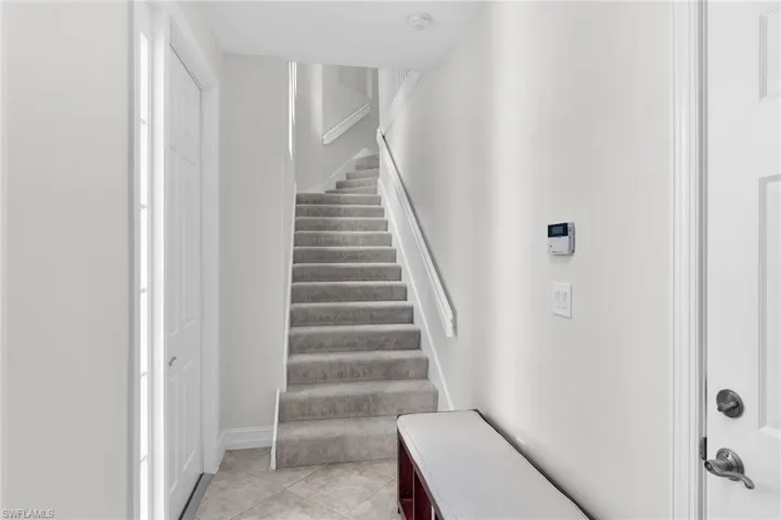 Staircase leading to living area.