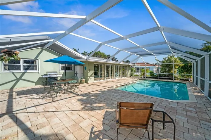 Huge Paver Patio Surrounding the Pool