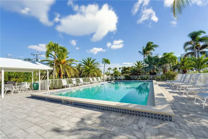 Community pool featuring a patio area