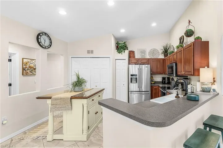 Island counter for added prep space and storage.