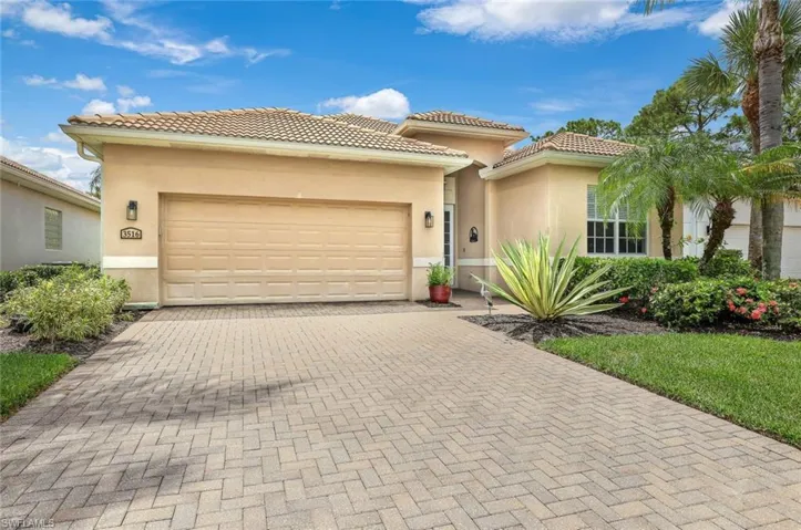 Mediterranean / spanish-style house with 2-car garage