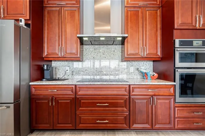 Note the granite backsplash