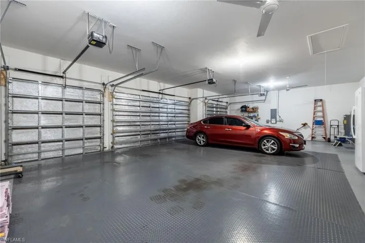 Extended 4 Car garage with floor mats