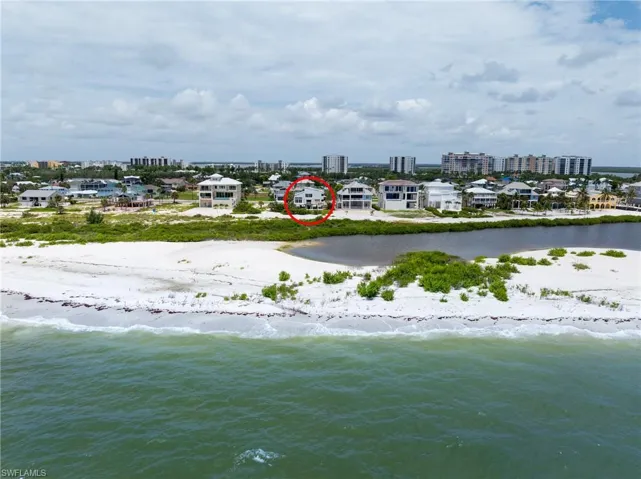 Water view featuring nearby beach and nearby urban area