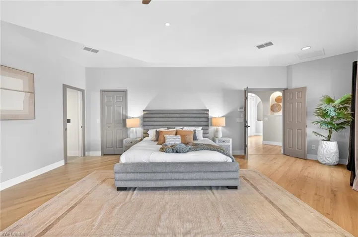 Bedroom featuring light wood finished floors, recessed lighting, and ceiling fan