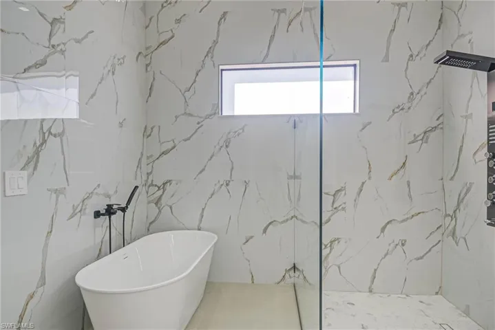 Bathroom with independent shower and bath