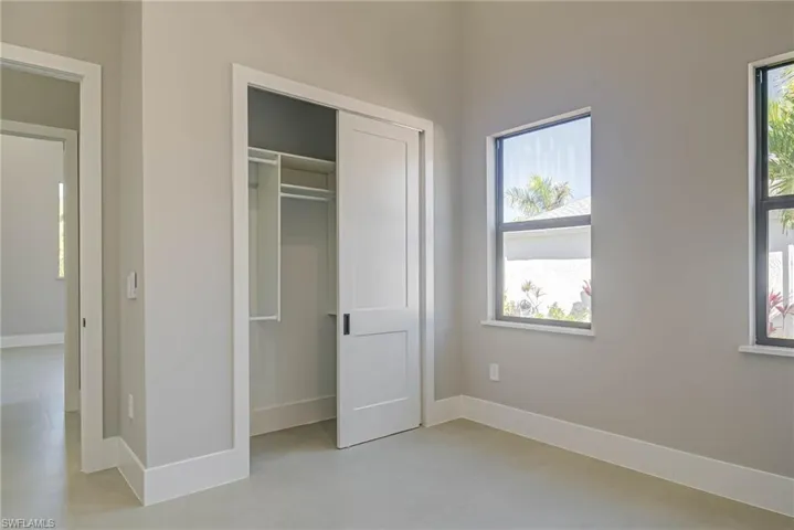 Unfurnished bedroom featuring a closet