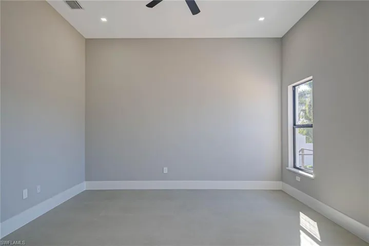 Unfurnished room with ceiling fan
