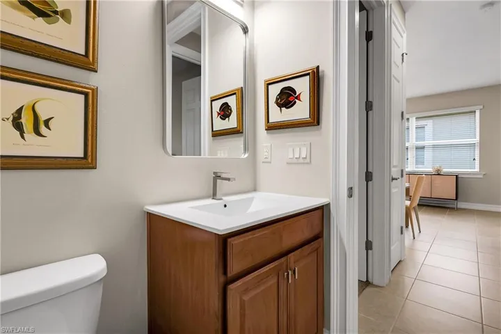 Bathroom featuring vanity and light tile patterned floors
