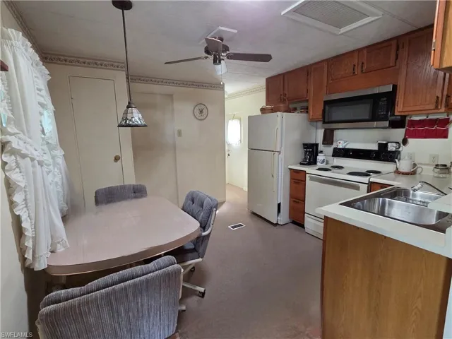 Eat-in Kitchen with plenty of cabinets and counter space.