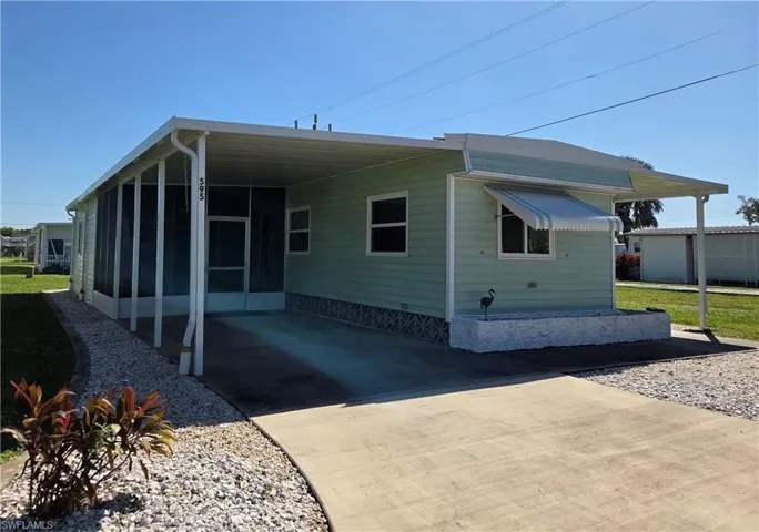 Well-maintained single-wide featuring a large Florida room on a quiet street with no through traffic.
