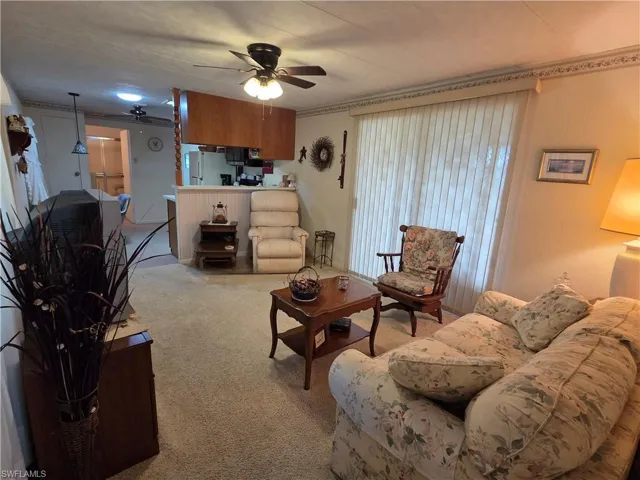 Enjoy the open living room & bright & airy eat-in kitchen.