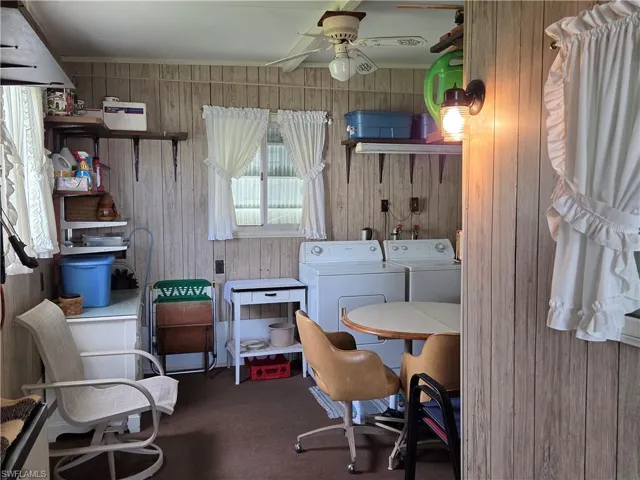 Shed is carpeted and has a ceiling fan. Washer & Dryer are located here.