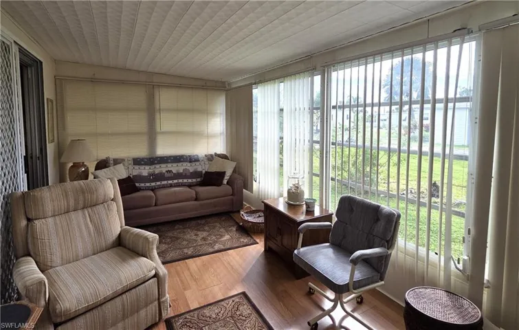 The Florida Room has laminate floors and LOTS of natural light.