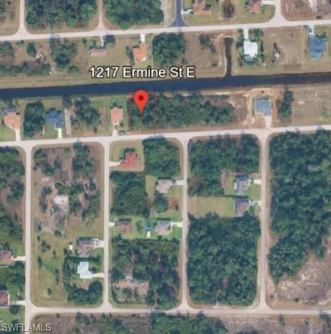 Aerial view of property's location with property parcel outlined