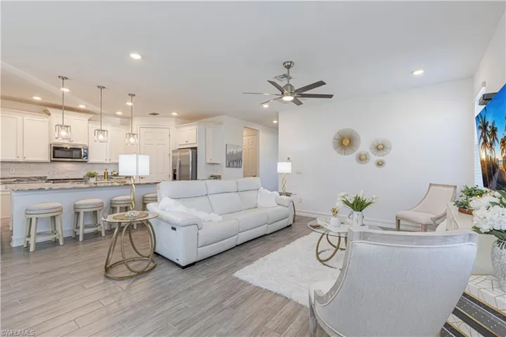 Living room with wood like tile floors