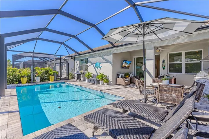 Heated pool with outdoor kitchen and extra propane grill included