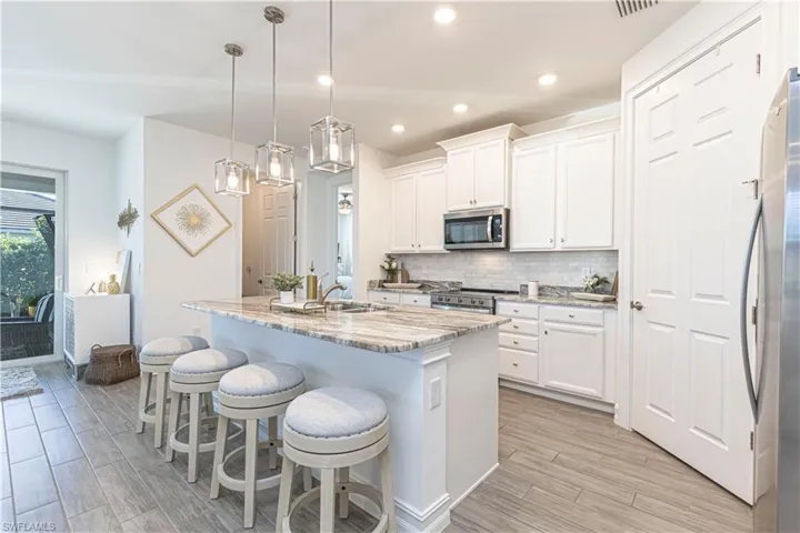 Coastal Kitchen with pendant lighting