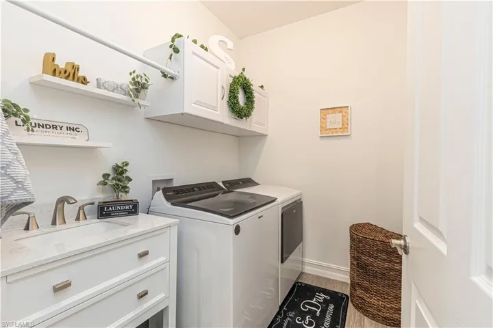Laundry Room with New Vanity w/ sink & Cabinets