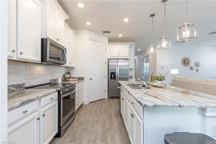 Kitchen with upgraded Stainless Steel Appliances & Large Pantry