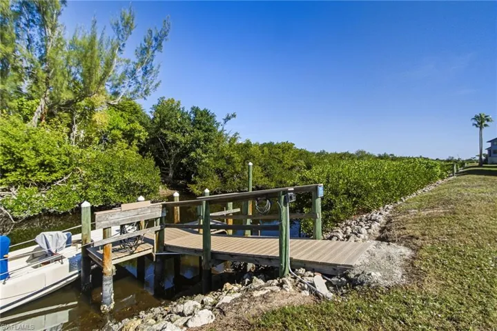 Dock in the backyard with water and electrical