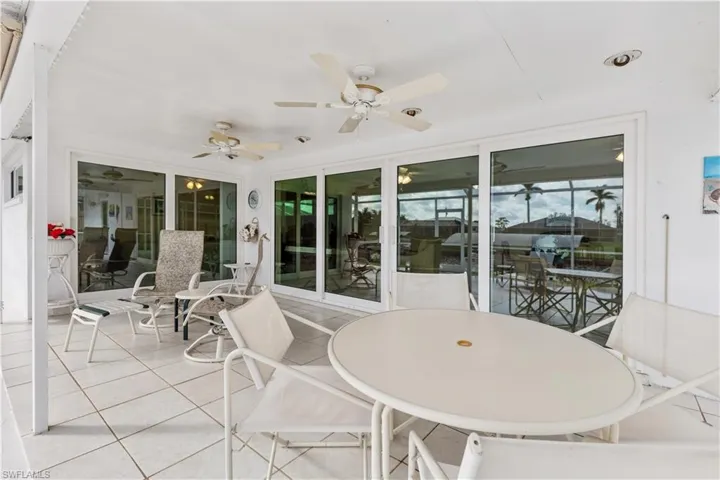 Lanai with Impact Slider Doors to Master Bedroom (left) and main living area (center right)