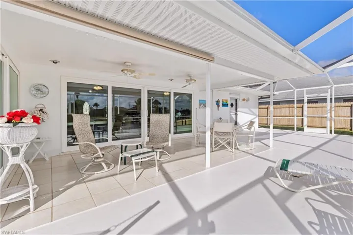 Screened in Lanai with a large deck and new screened cage.
