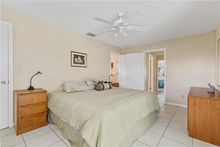 Master Bedroom with door to ensuite in center background.