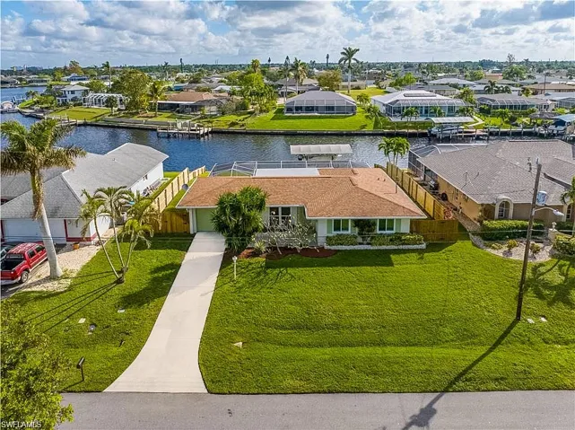 Aerial view of front of home on the Rubican canal.