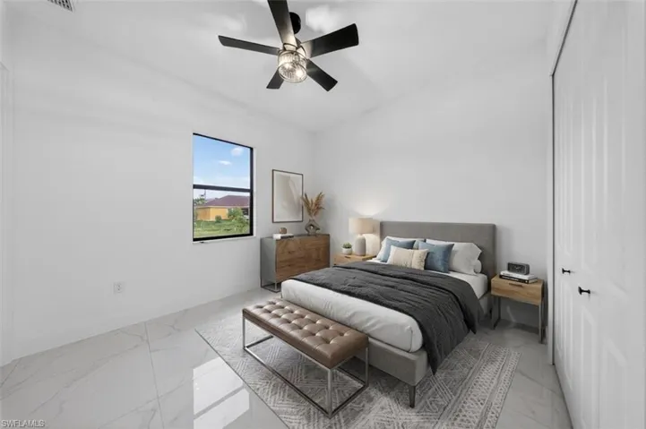 Bright interior featuring white walls and tile flooring