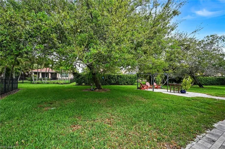 View of yard featuring a patio and a playground