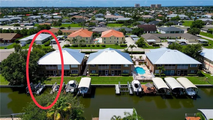 Aerial view of residential area with a large body of water