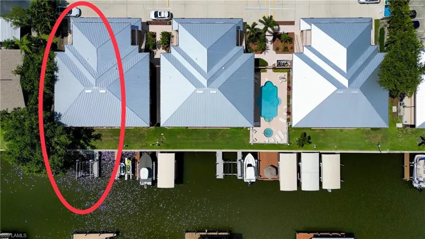Aerial view of property's location featuring a pool and property parcel outlined