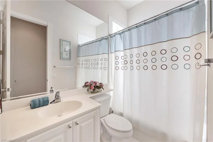 Full bath featuring shower / bath combination