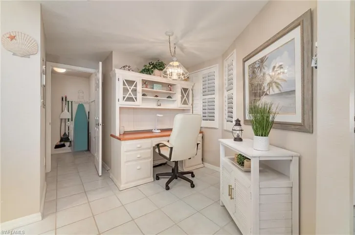 Office space with light tile patterned floors